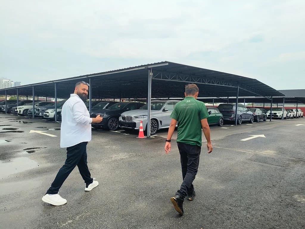 Logisoft team walking a customer vehicle storage yard during a site visit